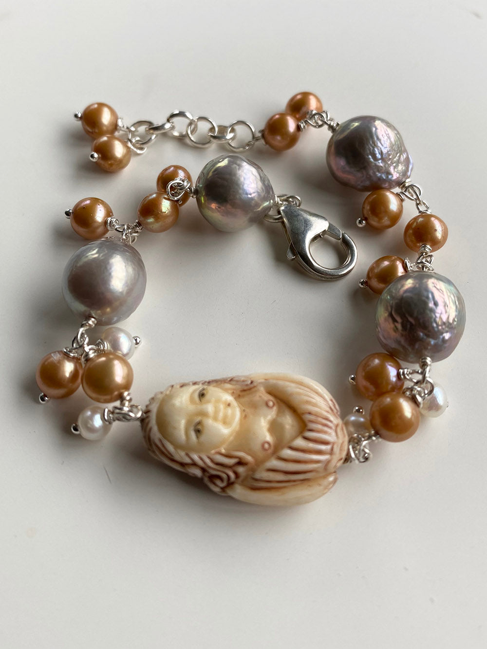 Carved Bone Mermaid Bracelet with Silver, Gold and White Freshwater Pearls by Linda Queally
