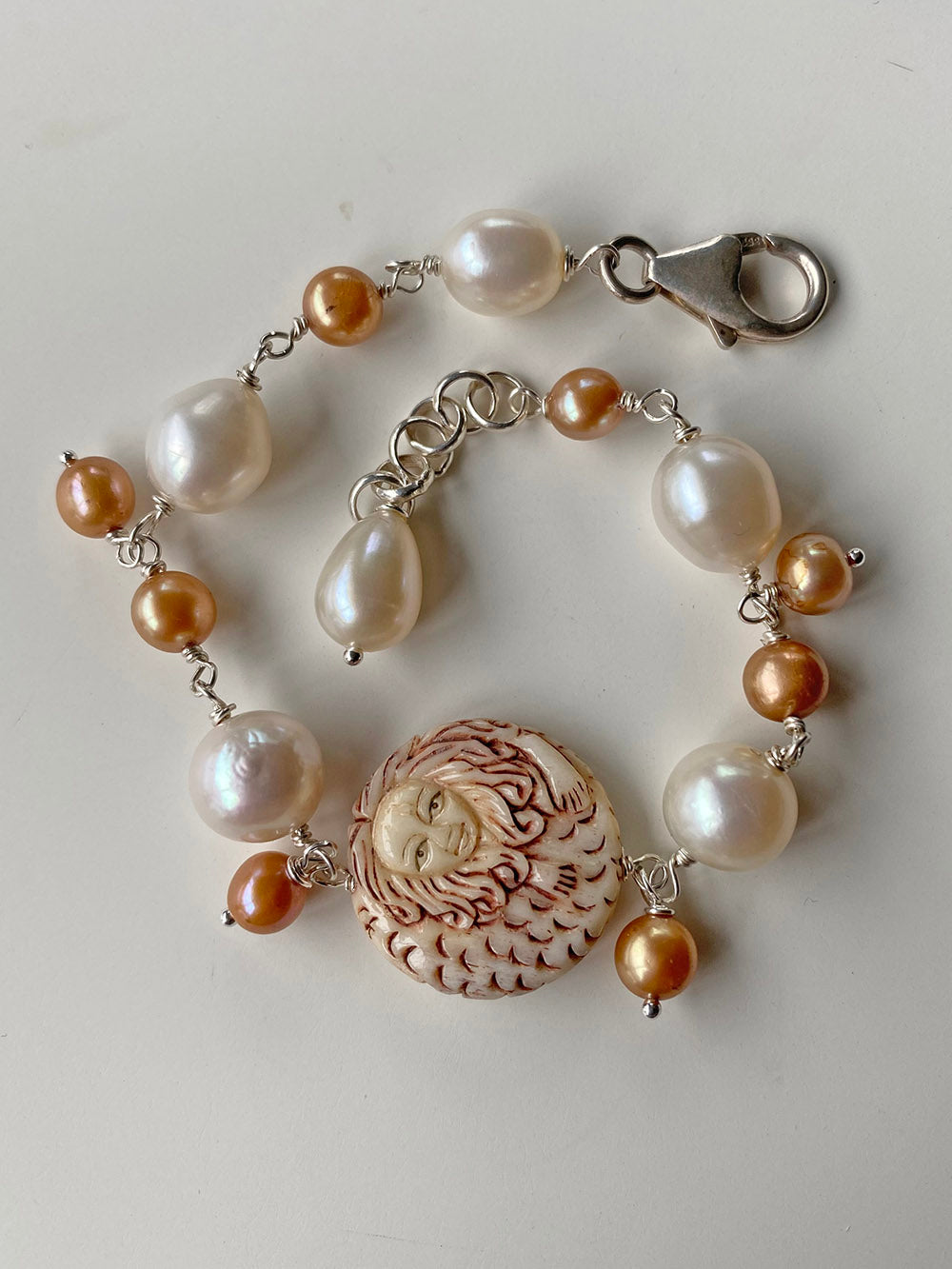 Carved Bone Mermaid Bracelet with Gold and White Freshwater Pearls by Linda Queally