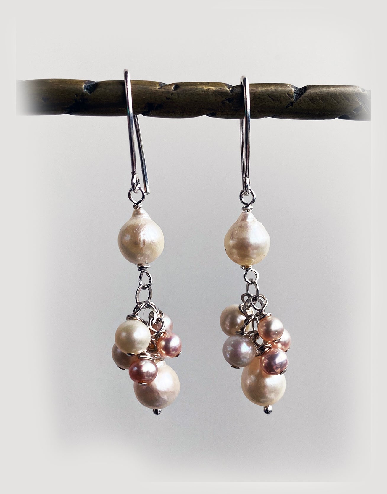Creamy Akoya Pearls with a White and Champagne Cluster by Linda Queally