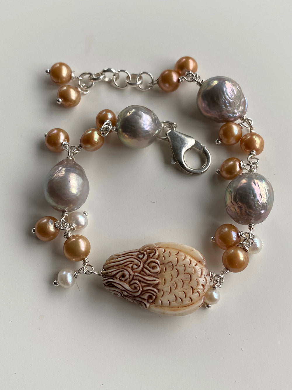 Carved Bone Mermaid Bracelet with Silver, Gold and White Freshwater Pearls by Linda Queally