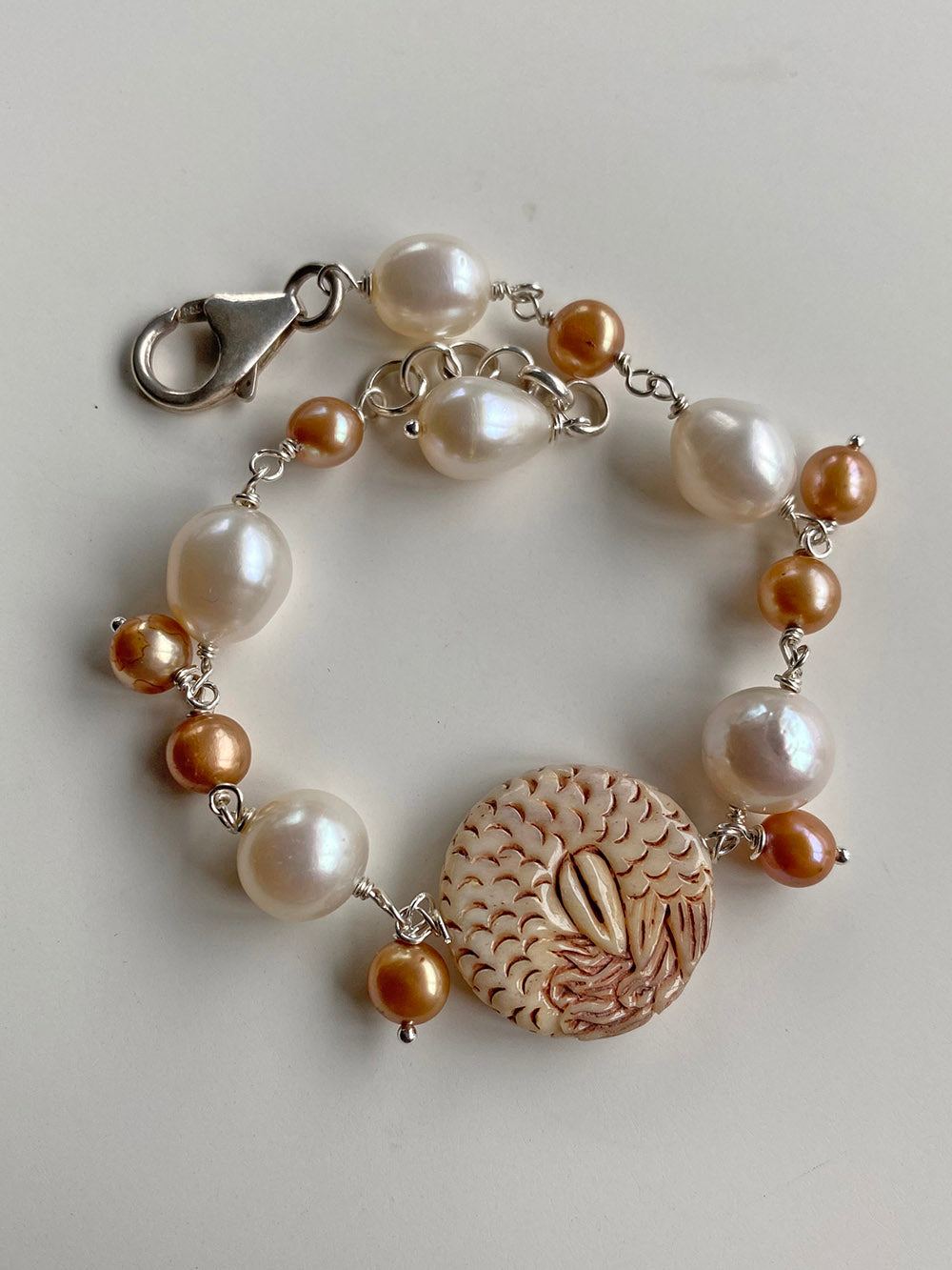 Carved Bone Mermaid Bracelet with Gold and White Freshwater Pearls by Linda Queally