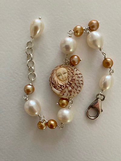 Carved Bone Mermaid Bracelet with Gold and White Freshwater Pearls by Linda Queally