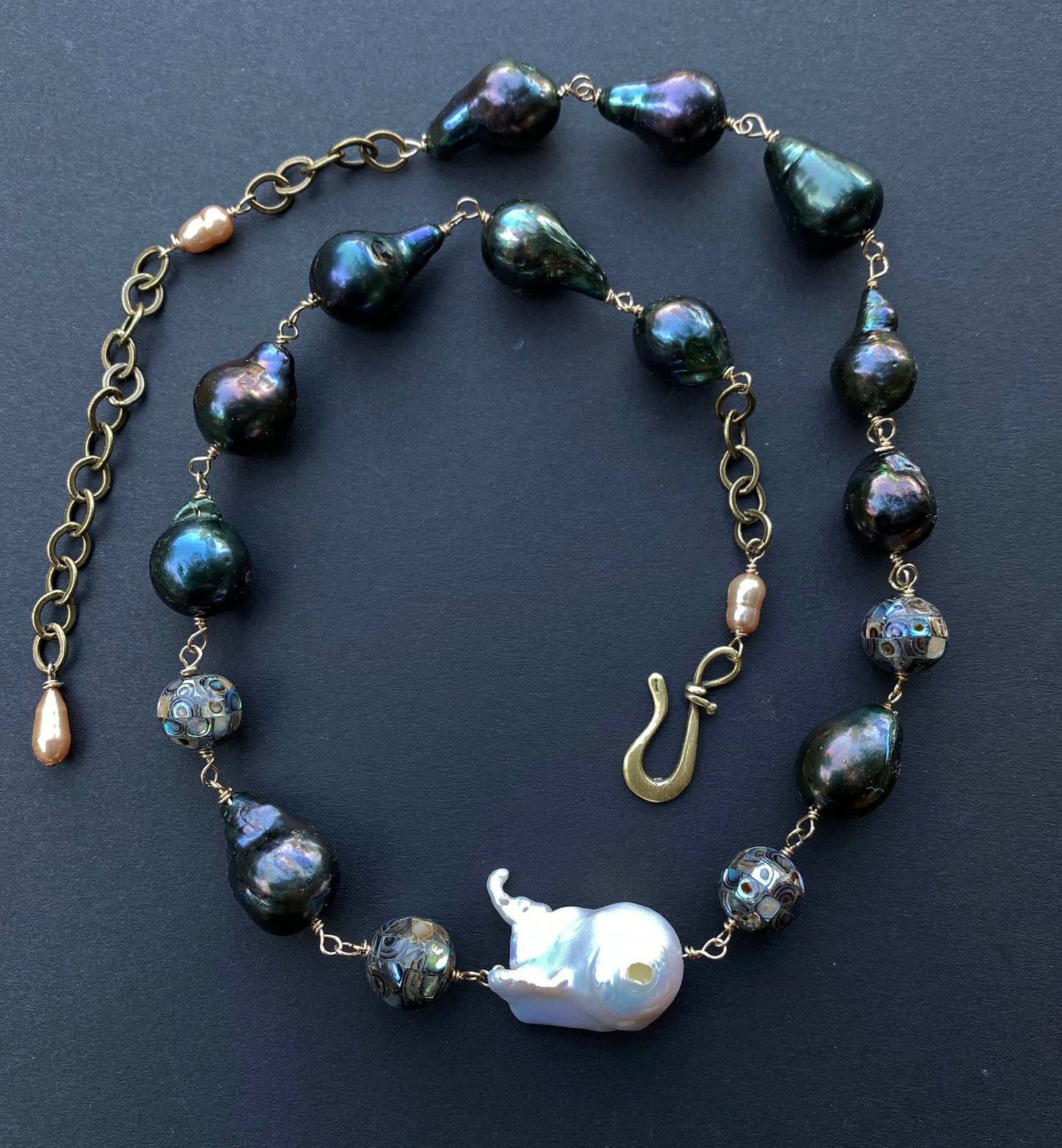 Fish Shaped Baroque Fireball Pearl with Iridescent Green Baroques and Mosaic Abalone